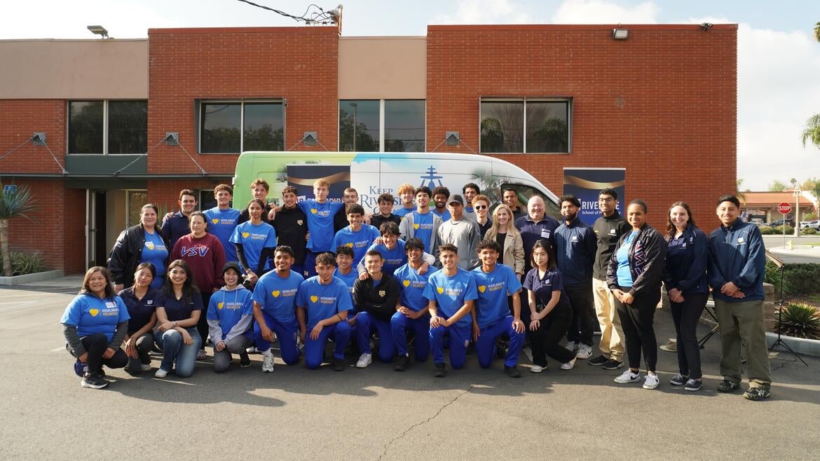 Group photo of participants for the Riverside Cleanup event