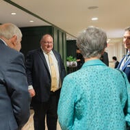 Photo of Dean Long and Elliot Interacting with Guests at D.C. Dinner